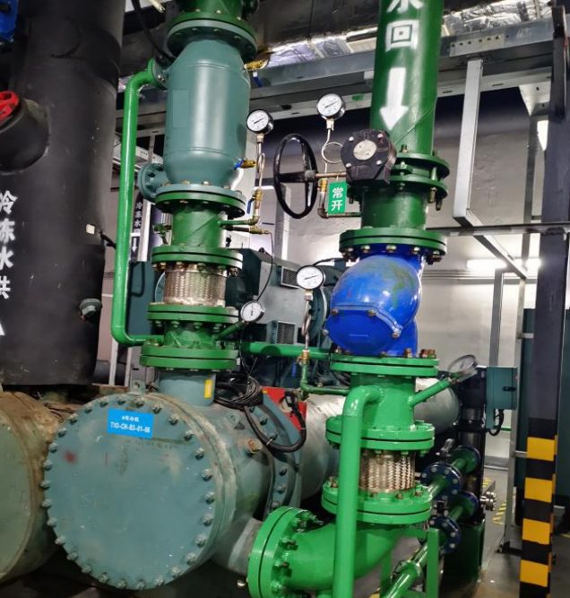 ATCS sponge-ball cleaning unit piped into the condenser water line at Changsha IFS