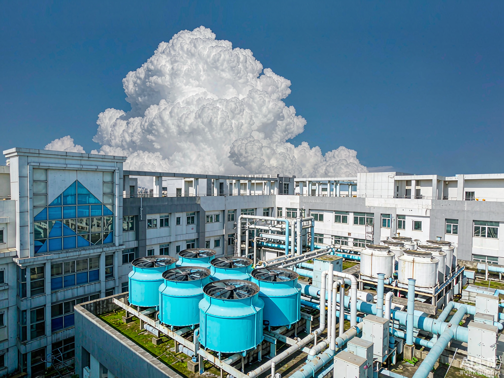 Illustrative: rooftop cooling towers of a commercial complex